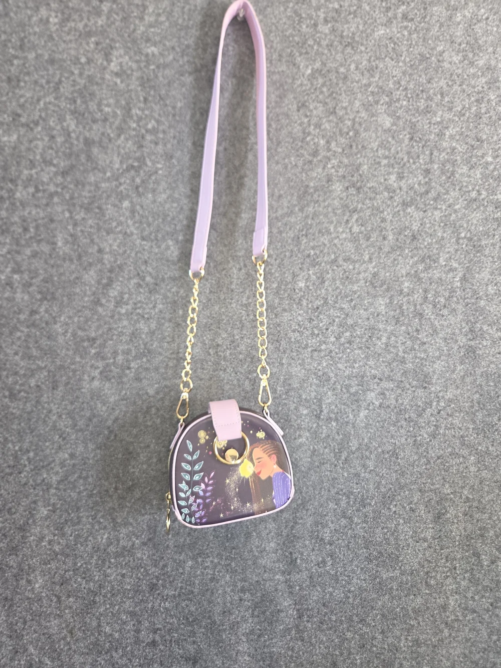 Enchanting crossbody bag features Asha from Disney's 'Wish' animated film,
